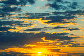 brightly colorful clouds in the evening sky. Lush colored clouds in the sky before sunset. dawn in the clouds