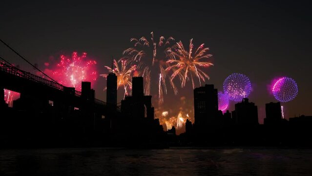 Firework over Manhattan the sunset in New York Independence Day 4 th of July fireworks on city lights