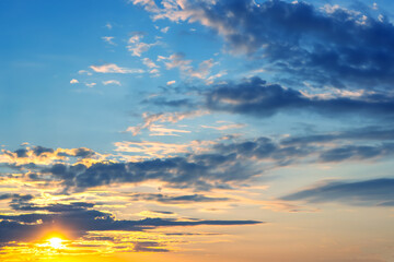 brightly colorful clouds in the evening sky. Lush colored clouds in the sky before sunset. dawn in the clouds