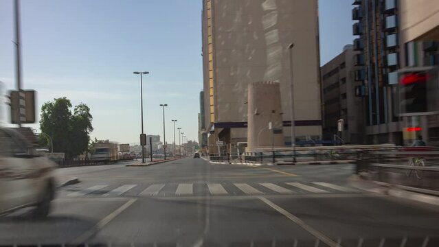 sunny day dubai city deira district traffic road driver pov panorama 4k timelapse uae