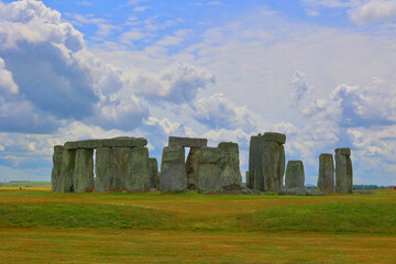 Stonehenge is a prehistoric monument on Salisbury Plain in Wiltshire. It consists of an outer ring of vertical sarsen standing stones. Inside is a ring of smaller bluestones.