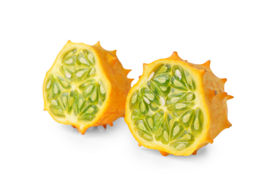 Kiwano fruit, green horned melon isolated on white, transparent background, PNG. Organic orange kiwano, African horned melon slices with green, jelly like inside with seeds close up.