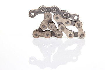 parts of bicycle chain links on white background