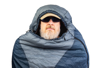 bearded man in a sleeping bag on a white background. equipment for recreation in tourism and travel