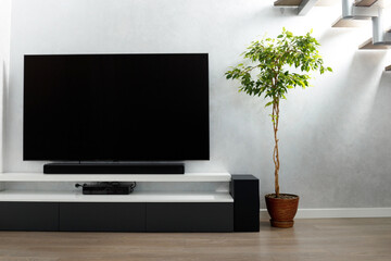 Modern living-room with TV and hifi equipment Sound bar