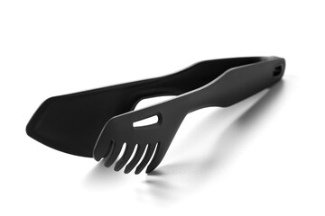 Black kitchen tongs, isolated on a white background.