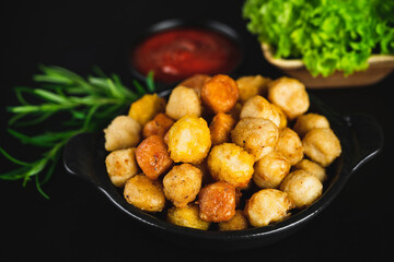 Fast homemade food.Chicken breaded schnitzels.Assorted Breaded Chicken nuggets Fillet with salad on a White Background,food at home.Breaded Chicken Inner Fillet,Chicken Breaded Raw Meat. Fast cooking.