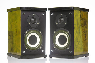 two stereo audio speakers on a white background. sound and media