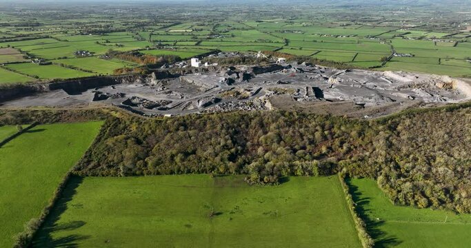 An aerial view of a big quarry in Ireland in 4k