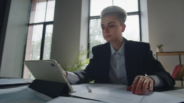 Concept of productive business lady in office. Businesswoman makes conclusion. Woman updates information to corporate server. Female data analytic calculate net profit loss
