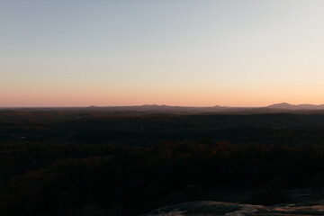 Sunset in the mountains in autumn. Landscape with mountains and picturesque sky at dawn. Horizon. Bird's eye view panorama. Bald Rock, Great Smoky Mountain National Park, South Carolina, USA