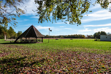 Wooden gazebo in the fall