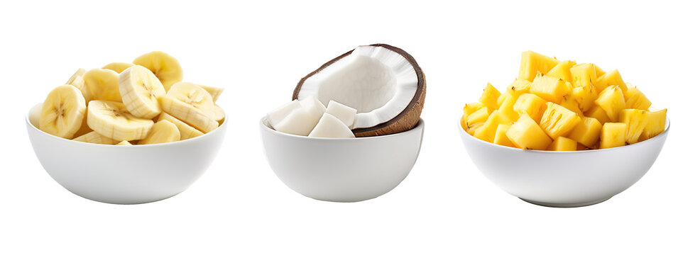 Bowls full of cut bananas, coconut and pineapple. Tropical fruit concept over isolated transparent background