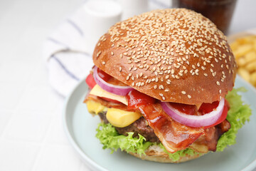 Delicious burger with bacon, patty and vegetables on white table, closeup