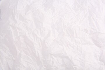 Texture of crumpled parchment paper as background, top view