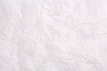 Texture of crumpled parchment paper as background, top view