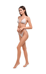 Young woman in stylish bikini isolated on white