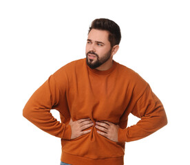 Young man suffering from stomach pain on white background