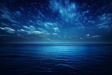 青く美しい広大な夜の海原の風景 - obrazy, fototapety, plakaty