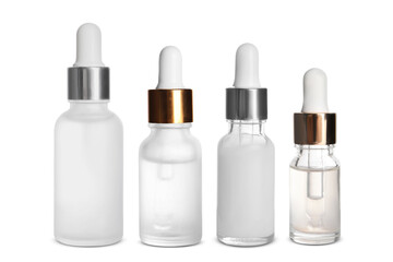 Serums in different bottles isolated on white, collection