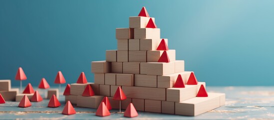Conceptual image of business leadership and success. Wooden blocks on a table