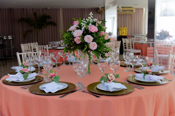 table and chairs, table set for a wedding reception,dining room with dining table, room interior, dining room, table setting,  decoration with natural flowers, table decorated with flowers