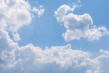 White bird clouds under the blue sky. sunny weather