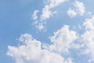 White bird clouds under the blue sky. sunny weather