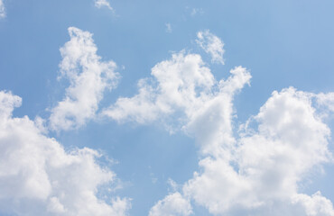 White bird clouds under the blue sky. sunny weather