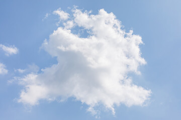 White bird clouds under the blue sky. sunny weather