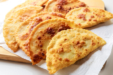 Ukrainian cuisine is tasty chebureki fried dough with meat.