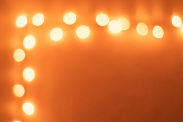 Abstract background of a string of lights with bokeh.