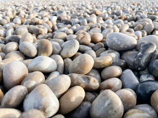 close up view of colorful stones on a beach