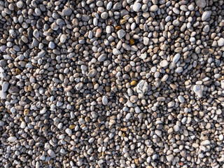 close up view of colorful stones on a beach