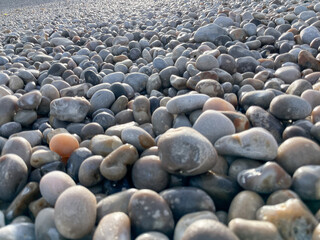 close up view of colorful stones on a beach