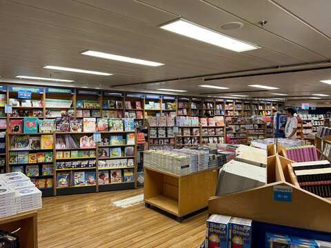 Herceg-Novi, Montenegro - 17 august 2023: Racks and shelves with colorful children books in a bookstore