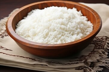 Fototapeta na wymiar White Rice In A Wooden Bowl