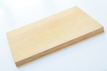 wooden cutting board isolated on white background, plank wood in the kitchen