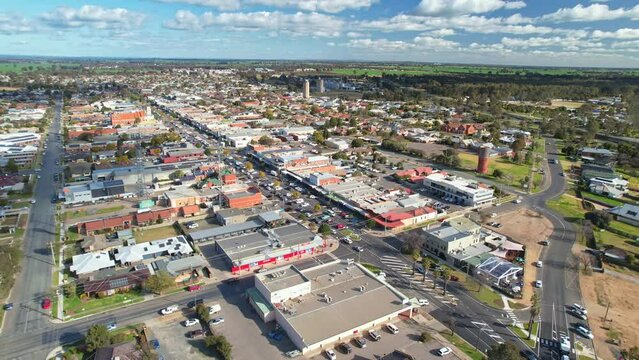 Aerial approaching the main shopping area of Belmore Street in Yarrawonga, Victoria, Australia