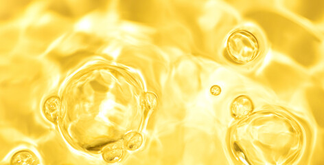 Natural background of oil olive yellow surface. Clear oil water with ripples and splashes. concept...