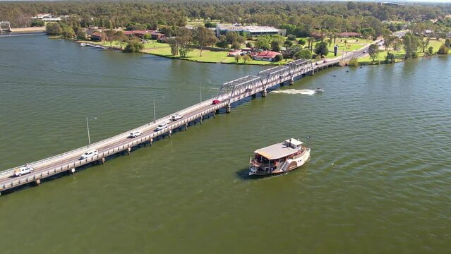 The Yarrawonga Mulwala bridge with the paddle steamer Cumberoona in the foreground