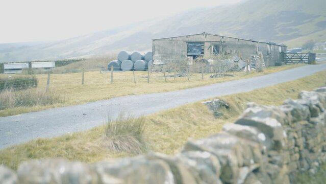 A farm at the base of Pendle Hill in Lancashire in Autumn