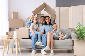 Happy family at home on moving day