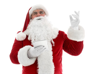 Santa Claus with tablet computer on white background