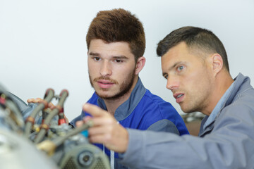 Obraz premium two plumber fixing bathroom water supply