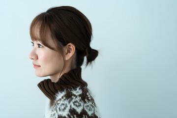 Fototapeta premium ニットを着た女性