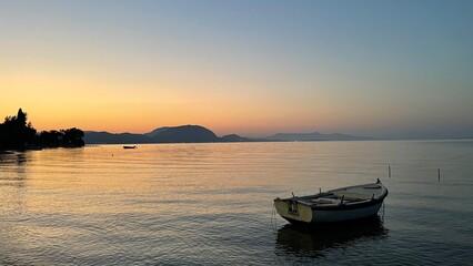 Zachód słońca na wyspie Korfu w Grecji - obrazy, fototapety, plakaty