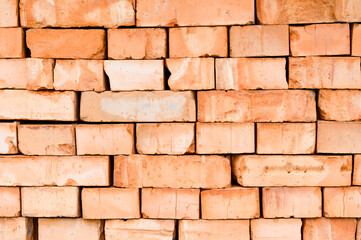 Obraz premium Textured background of stacked bricks