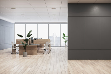 Modern coworking office interior with empty mock up place on wall, panoramic windows and city view,...