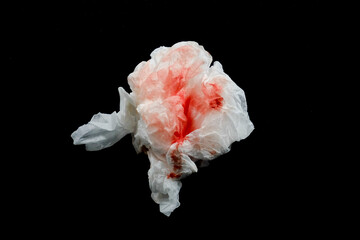 white tissue with blood clots with dark background. white tissue used to wipe blood from wounds - obrazy, fototapety, plakaty